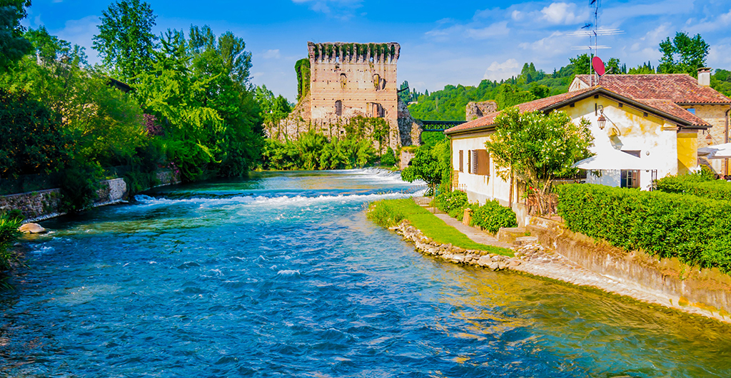 Stunning view of Borghetto historical center and Visconti bridge, Valeggio sul Mincio, Italy