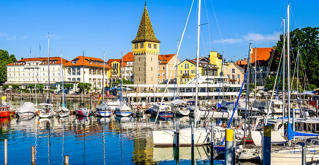 famous harbor with sailboats at the historic island of Lindau am Bodensee - Germany