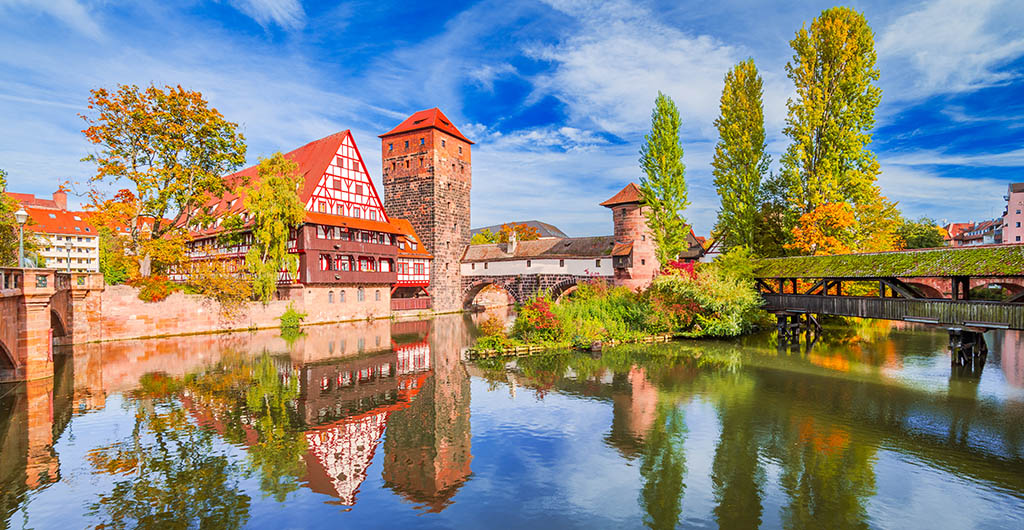Nuremberg, Germany. Autumn colors and picturesque view of the half-timbered old houses, old Nurnberg on the banks of the Pegnitz River, Bavaria.