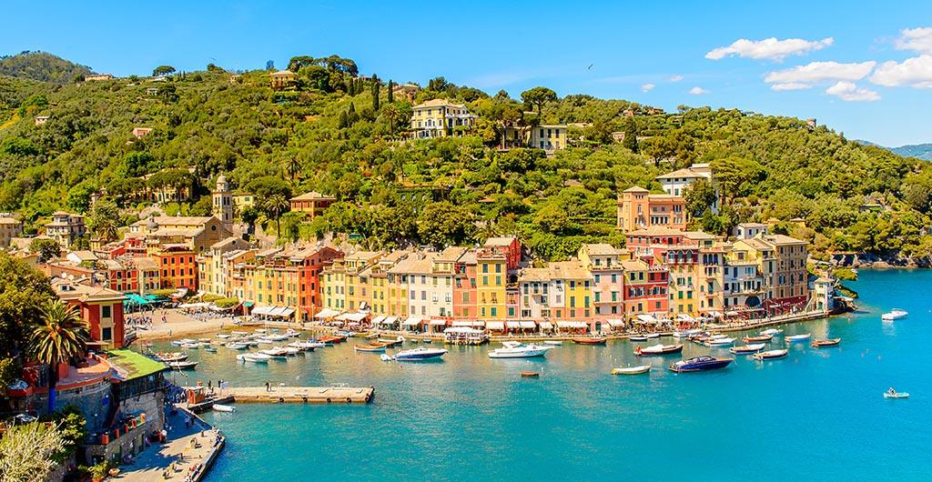 Panoramiv view of Portofino, is an Italian fishing village, Genoa province, Italy. A vacation resort with a picturesque harbour and with celebrity and artistic visitors.
