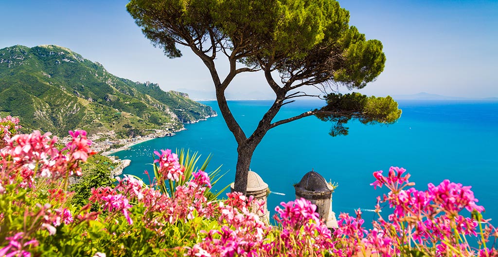 Scenic picture-postcard view of famous Amalfi Coast with Gulf of Salerno from Villa Rufolo gardens in Ravello, Campania, Italy