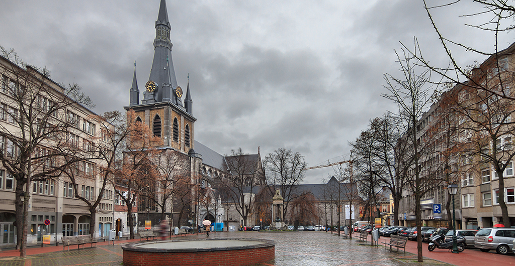 Beautiful winter cityscape of Liege, Belgium, with the St. Paul's Cathedral on a ominous cloudy day