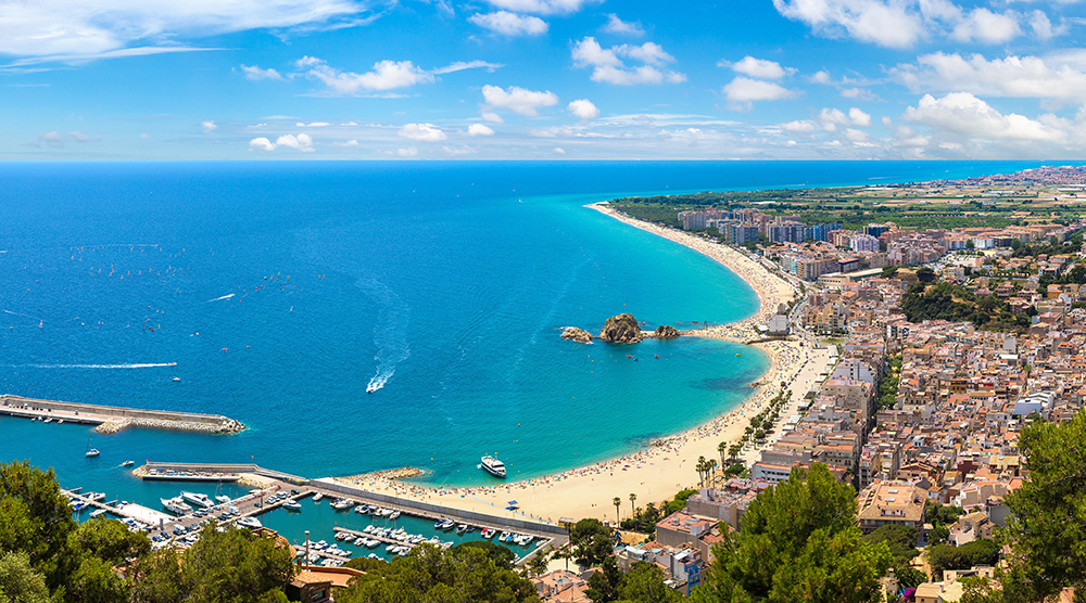 Panoramic aerial view of Blanes in Costa Brava in a beautiful summer day, Spain
