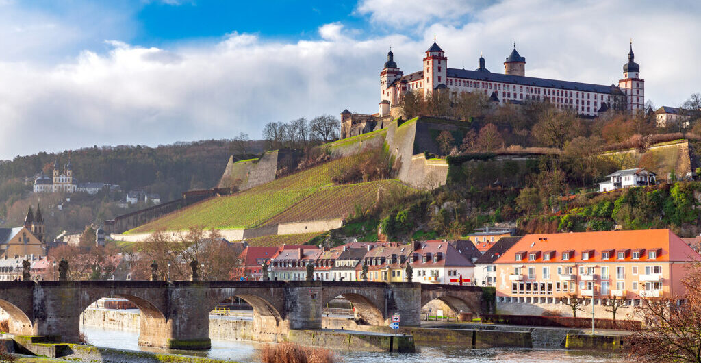 Old medieval stone bridge with sculptures in the morning. Germany. Wurzburg Bavaria