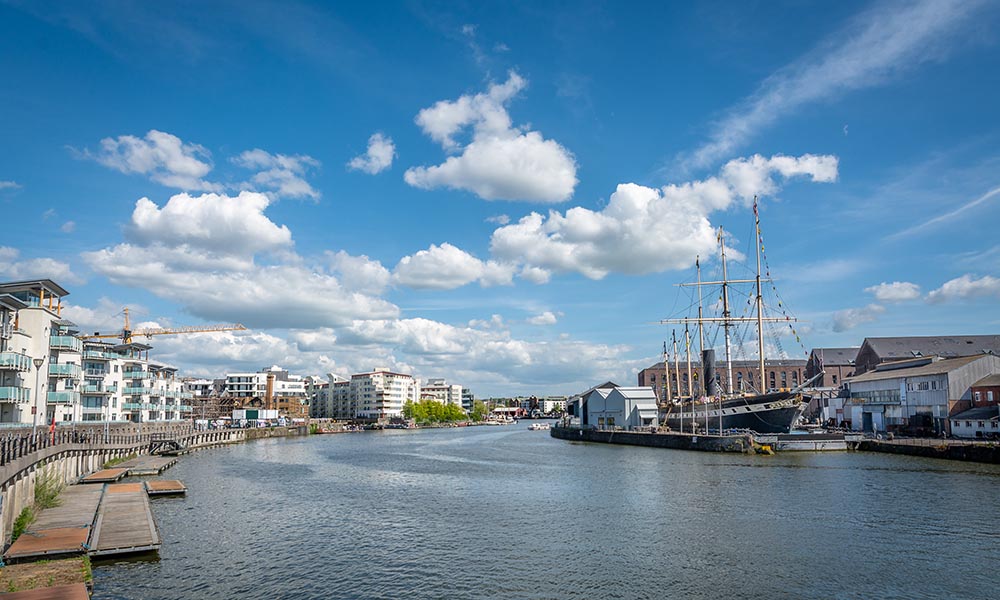 The beautiful Bristol Harbour under the cloudy sky in England