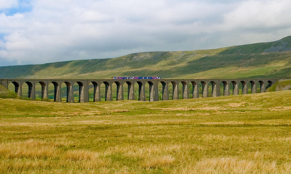 20879669 - train travels across ribblehead viaduct