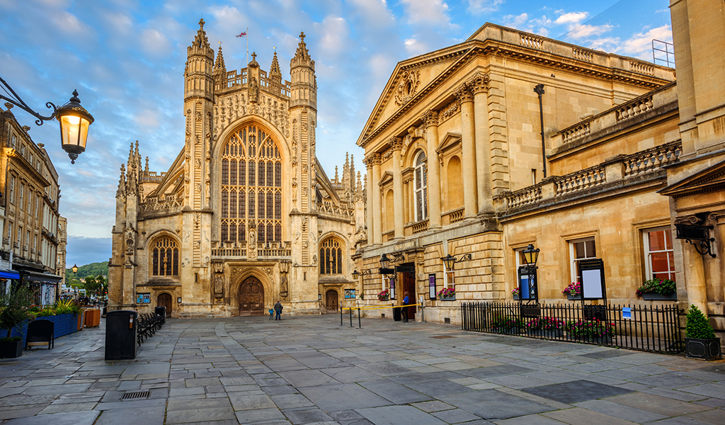 Historic Bath Abbey and roman baths building in Bath Old town center, England