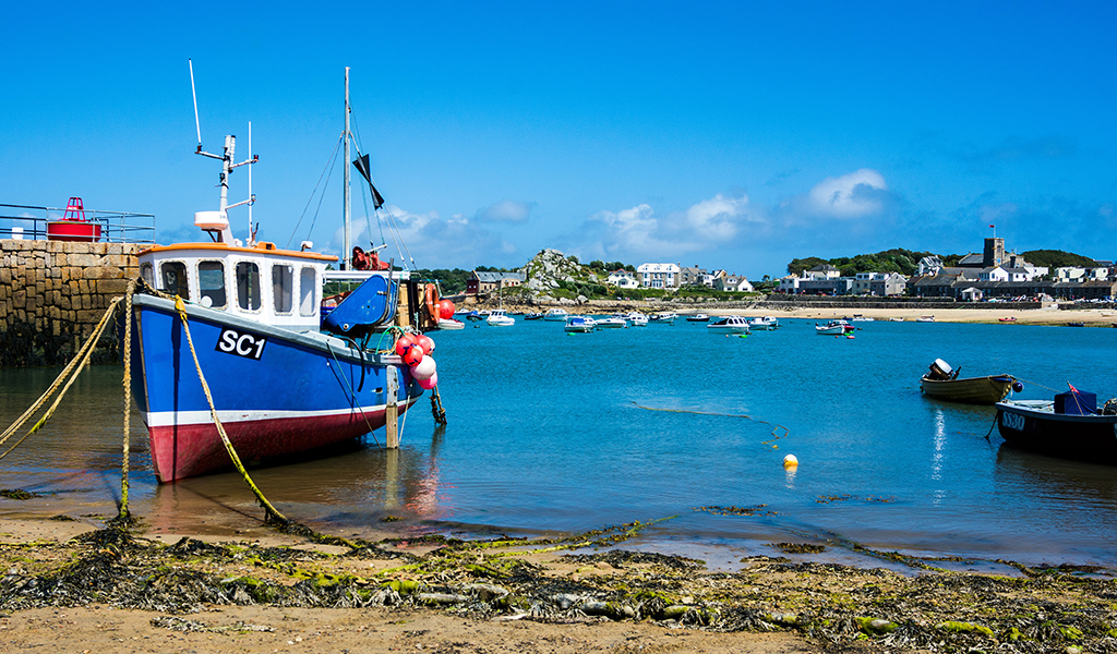 A fishing boat on the beach at Hugh Town harbor, St. Mary's, Scilly Isles.