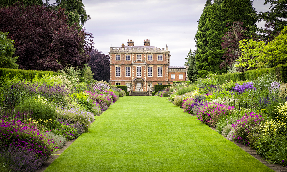 At Newby Hall, 172m long, double herbaceous borders leading to a fine William and Mary house.