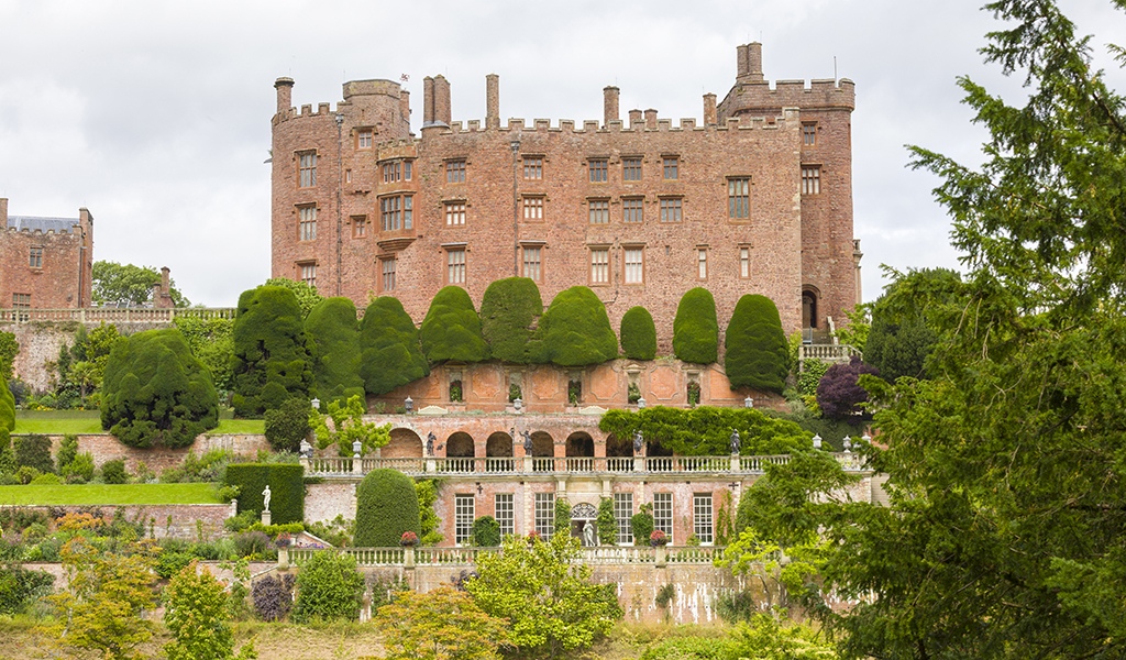 The castle and terraces viewed from The Wilderness at Powis Castle and Garden, Powys